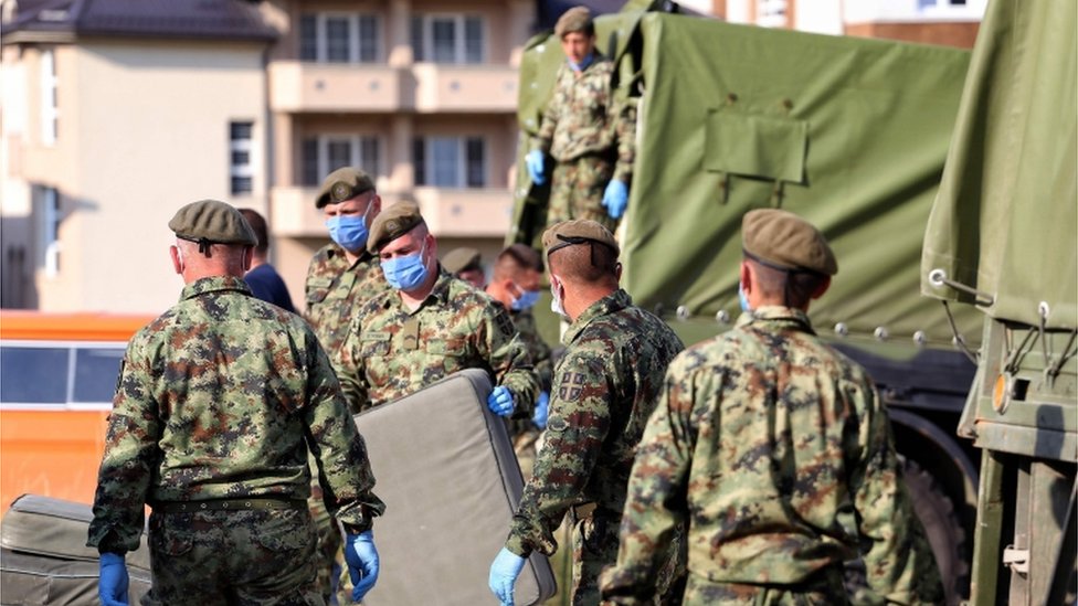 Soldiers prep a filed hospital in Novi Pazar