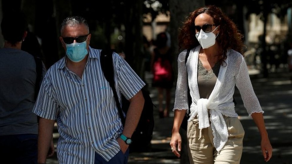 People wearing masks in Catalonia