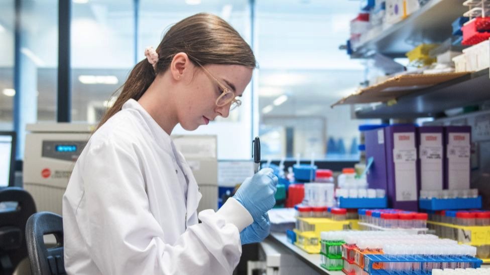 Blood samples from coronavirus vaccine trials are handled inside Jenner Institute at Oxford University, June 2020