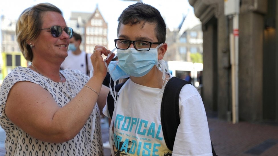 Residents in the Netherland's three largest cities will be told to wear masks in shops from Tuesday