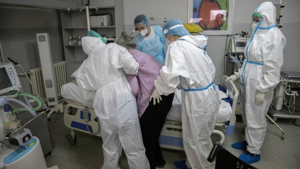 Medical workers treat a patient suffering from the coronavirus disease (COVID-19) at Clinical Hospital Center Zemun in Belgrade, Serbia,