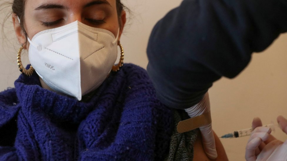 Woman receiving Covid vaccine